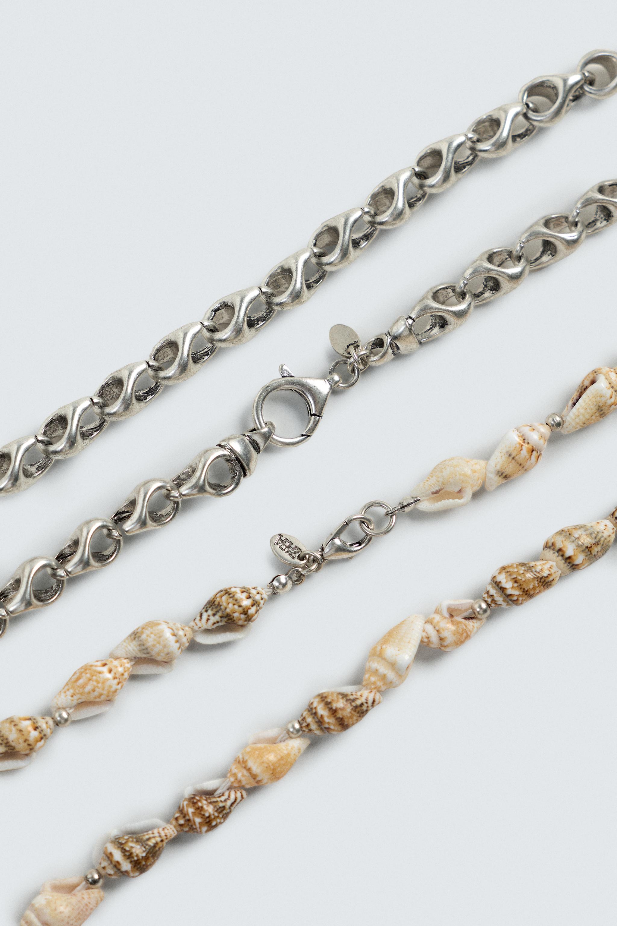 LOT DE 2 COLLIERS EN MATIÈRES VARIÉES